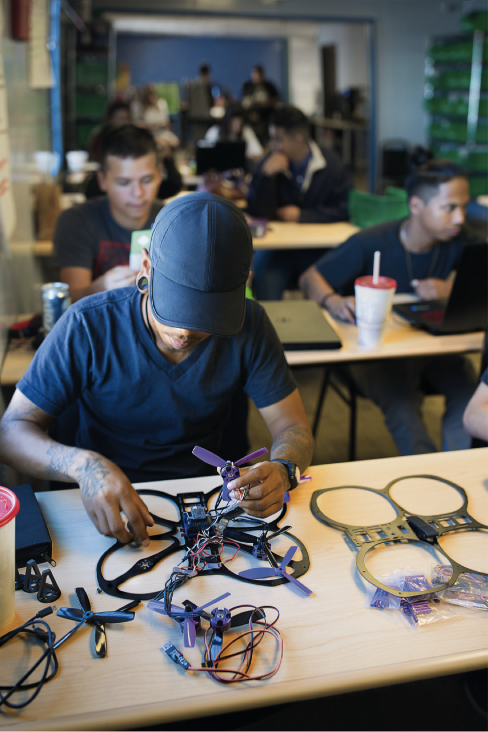 Student working on a drone