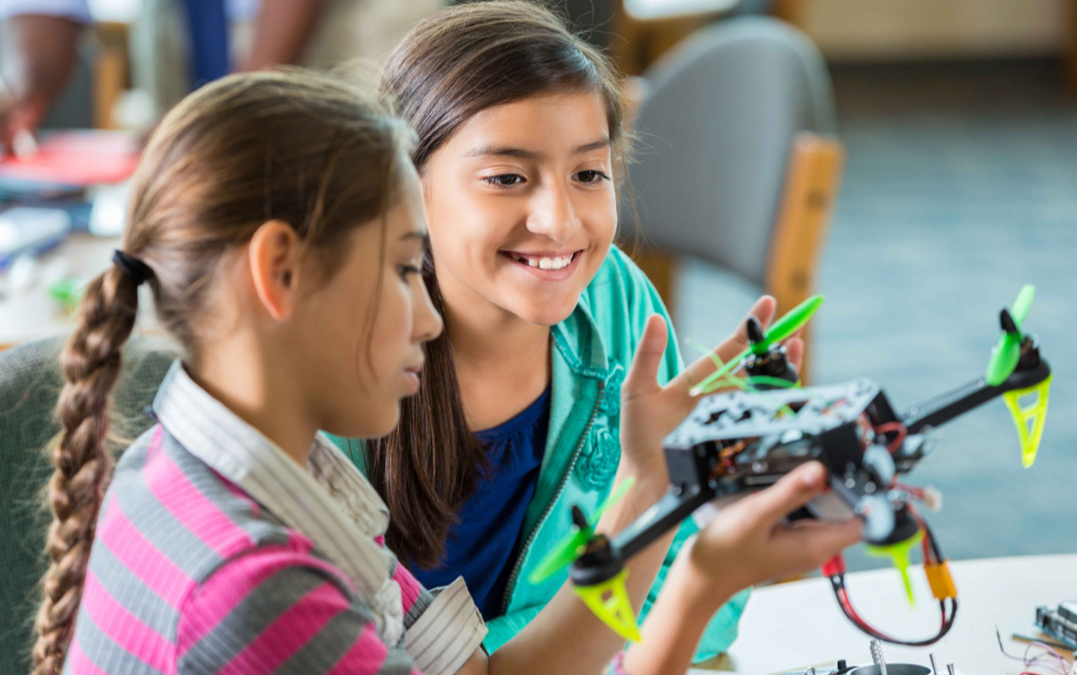 Female students working on a project